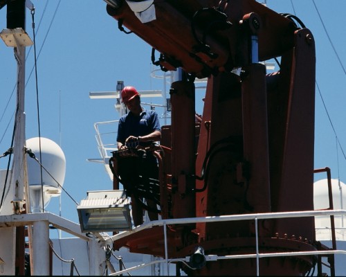 Stu moves heavy mooring elements into position